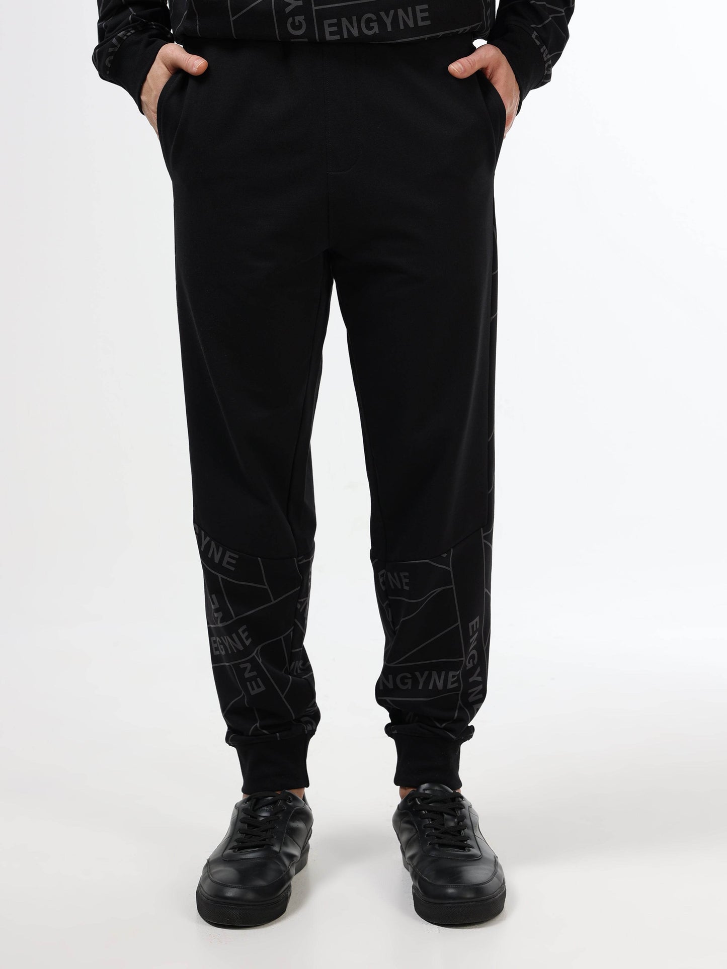 Regular Fit Cut and Sew Joggers in Cotton Poly Lycra Rougen Loop Knit with All Over ENGYNE Rotary Discharge Print - Black - ENGYNE
