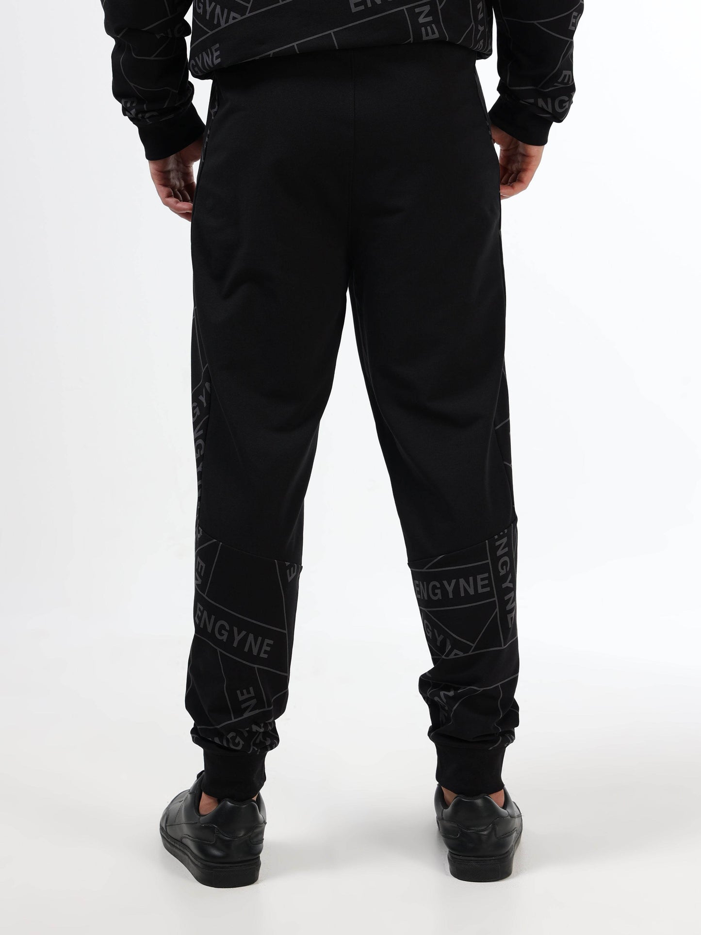 Regular Fit Cut and Sew Joggers in Cotton Poly Lycra Rougen Loop Knit with All Over ENGYNE Rotary Discharge Print - Black - ENGYNE