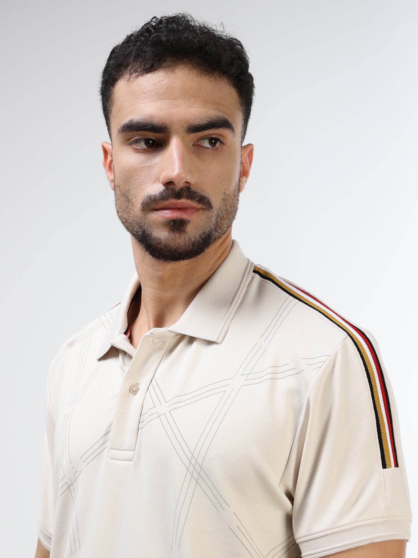 Supima Cotton Lycra Interlock with Pigment Printed Panels, Cut and Sew Detailing, and Speedbreaker Collar and Cuff Beige Polo - ENGYNE