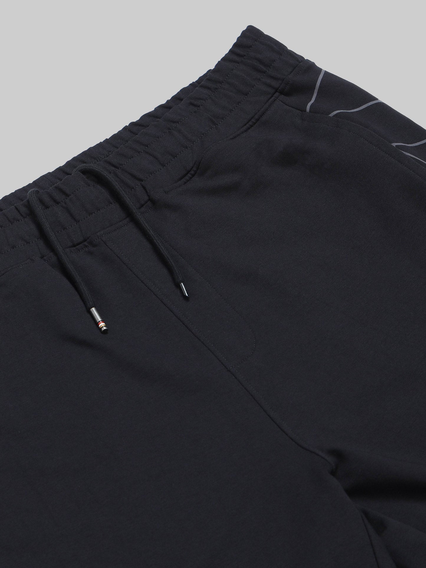 Regular Fit Cut and Sew Joggers in Cotton Poly Lycra Rougen Loop Knit with All Over ENGYNE Rotary Discharge Print - Black - ENGYNE