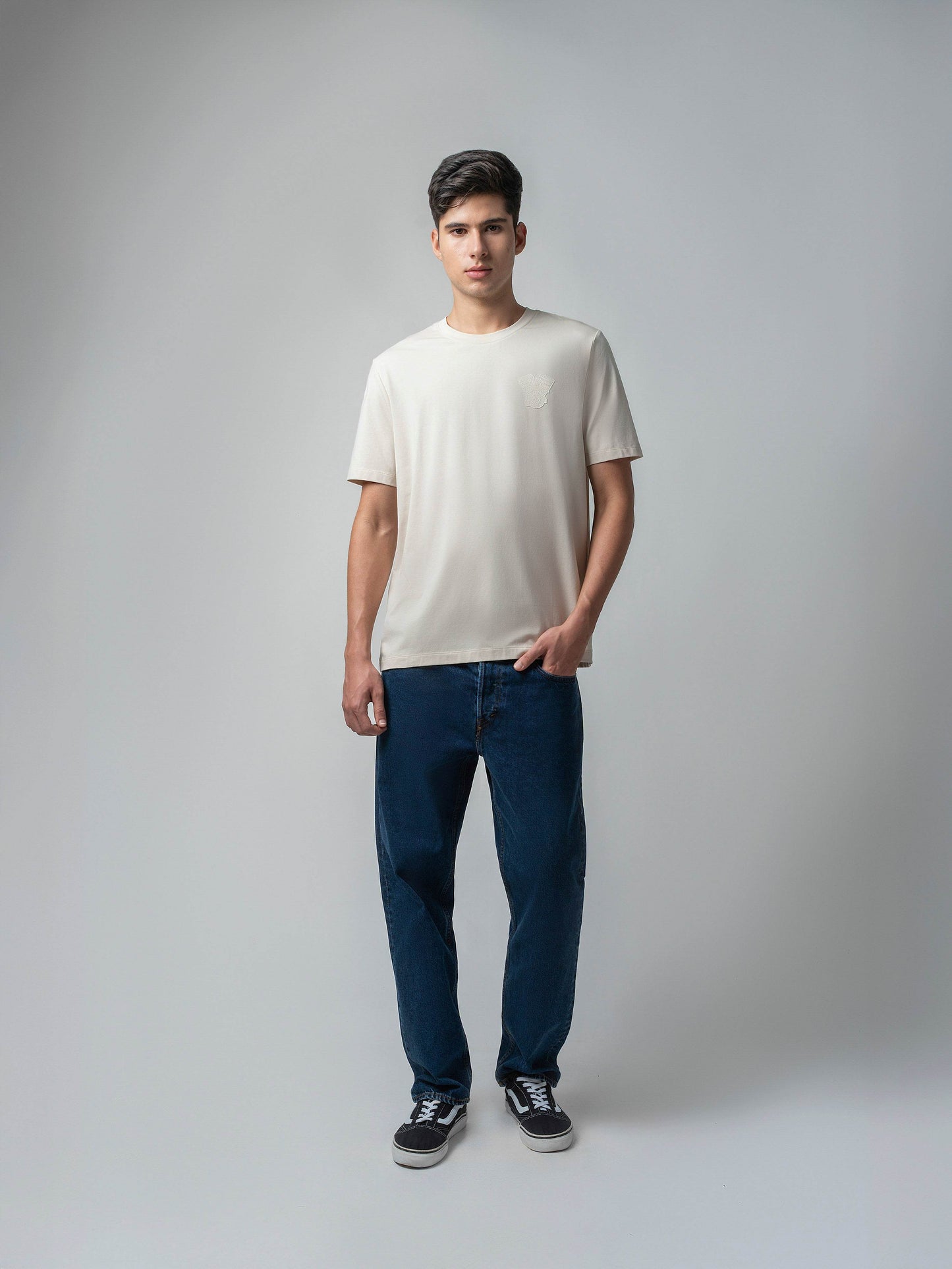 Jersène LuxeKnit with Engyne Appliqué Back and Front Iconic Emblem Beige Tee - ENGYNE