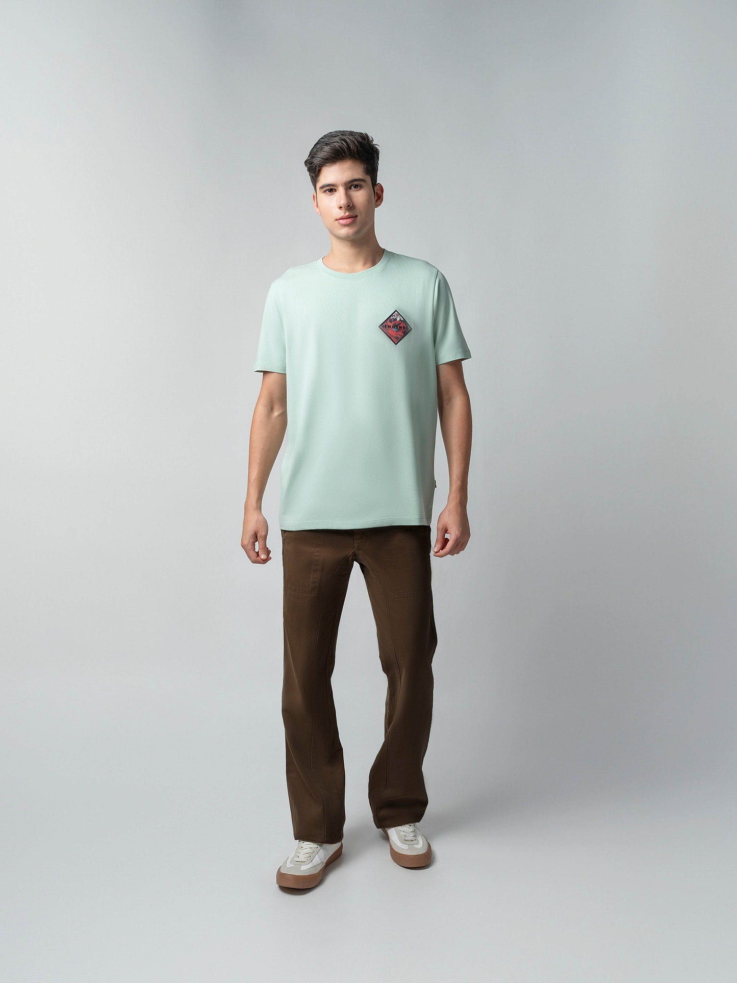 Rougen Cotton Lycra with Sublimation Print and Embroidered Badge Light Green T-shirt - ENGYNE