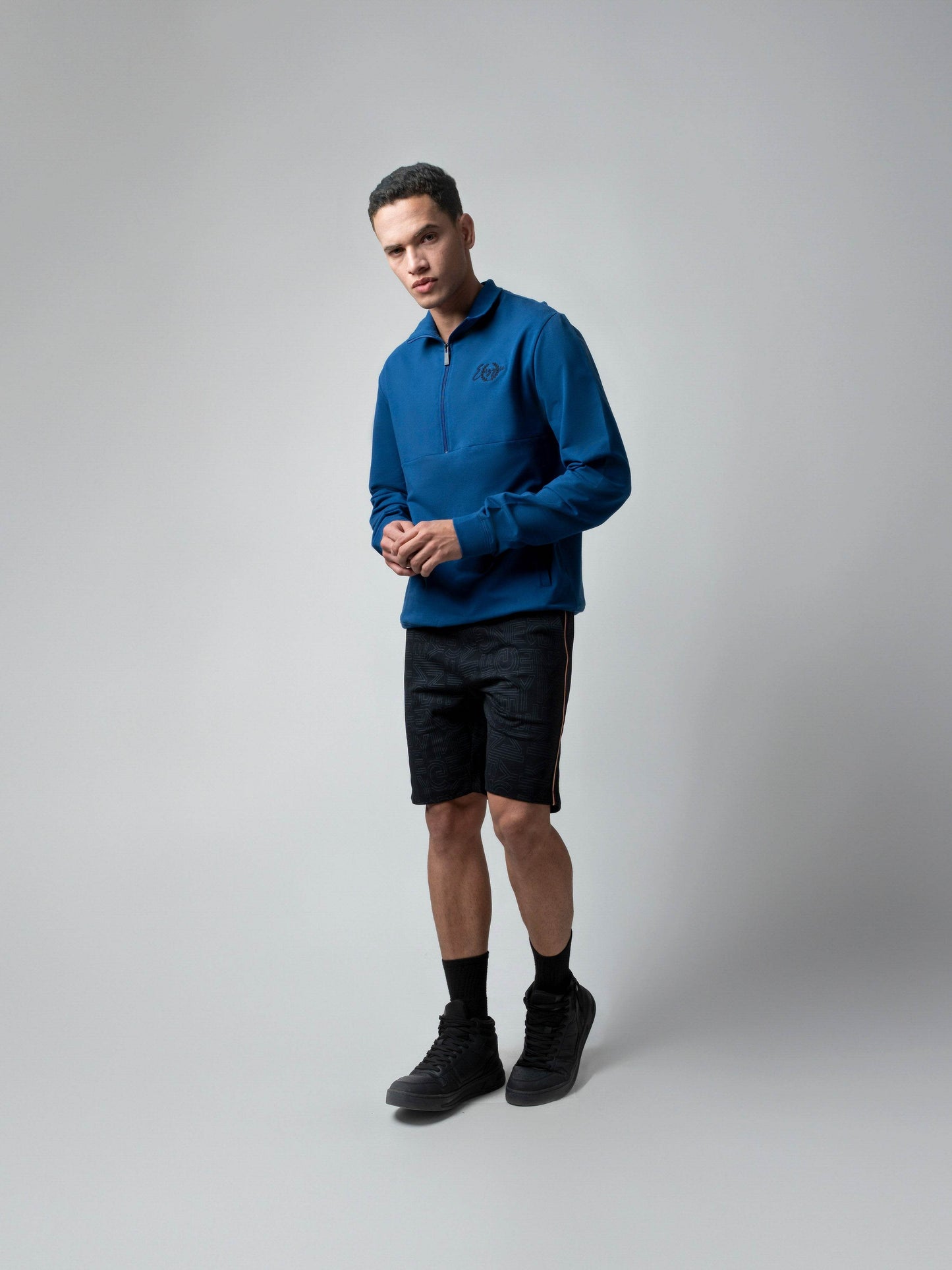 Rougen Cotton Elastane Loop Knit Shorts with All-Over Discharge Print Black - ENGYNE