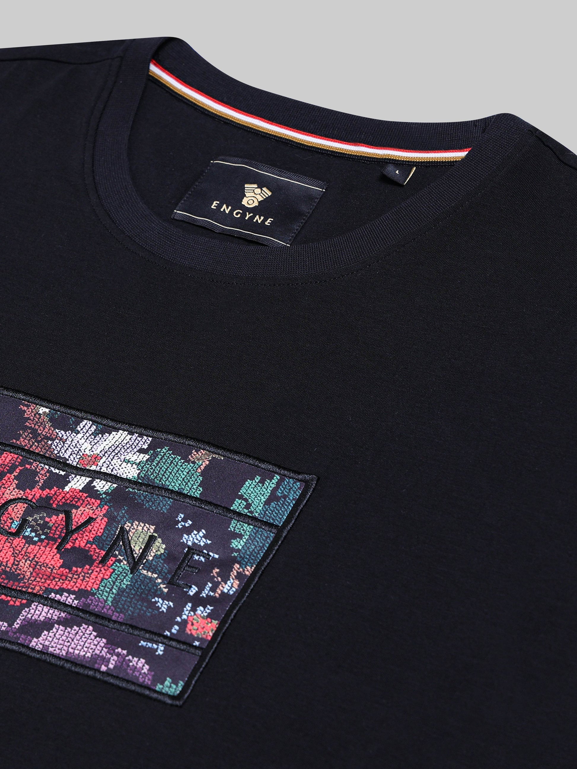 Supima Cotton Lycra with Sublimation-Printed Chest Appliqué and Embroidery Black T-shirt - ENGYNE
