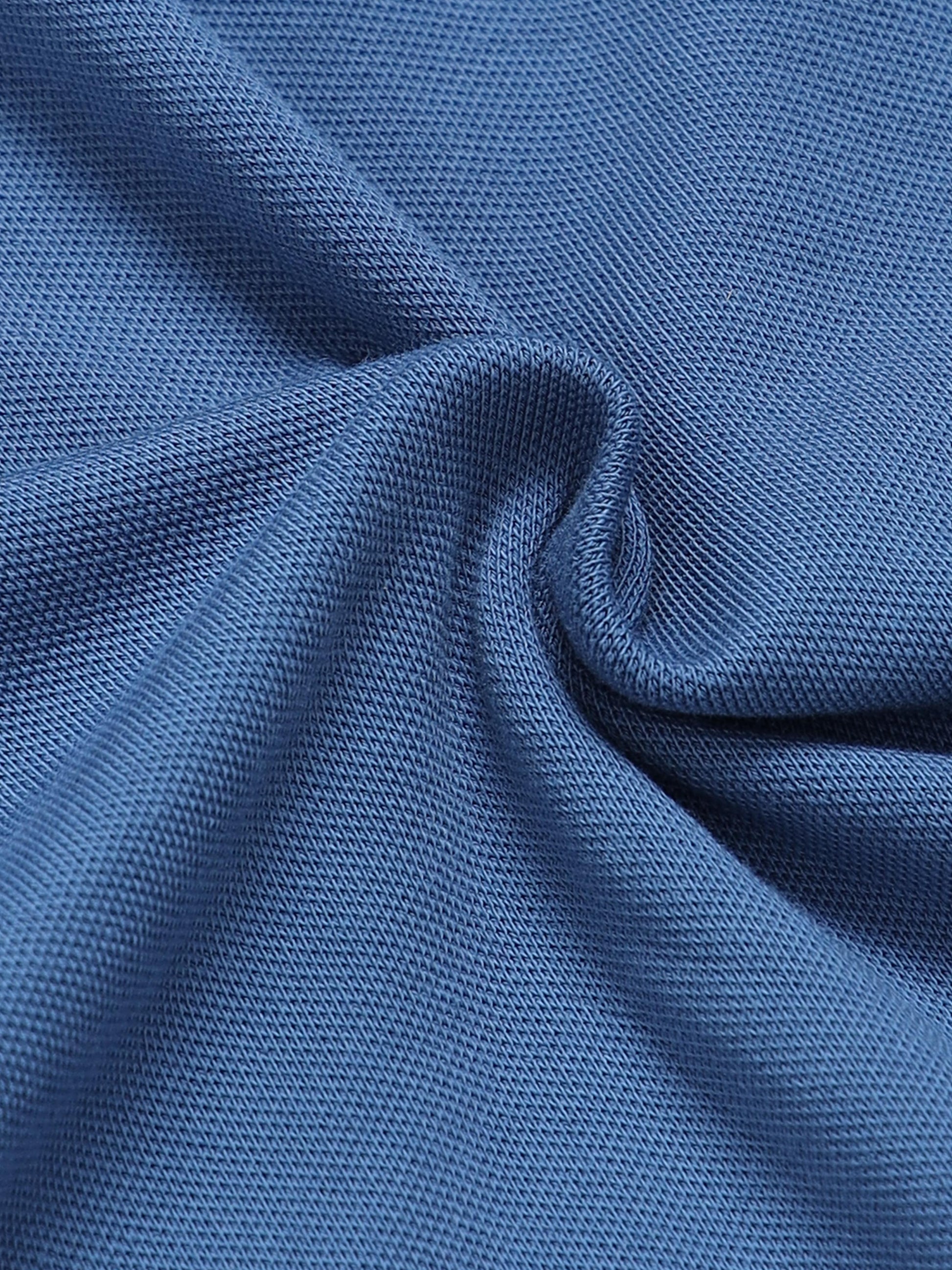 Men's sky blue polo t-shirt with printed raglan sleeves