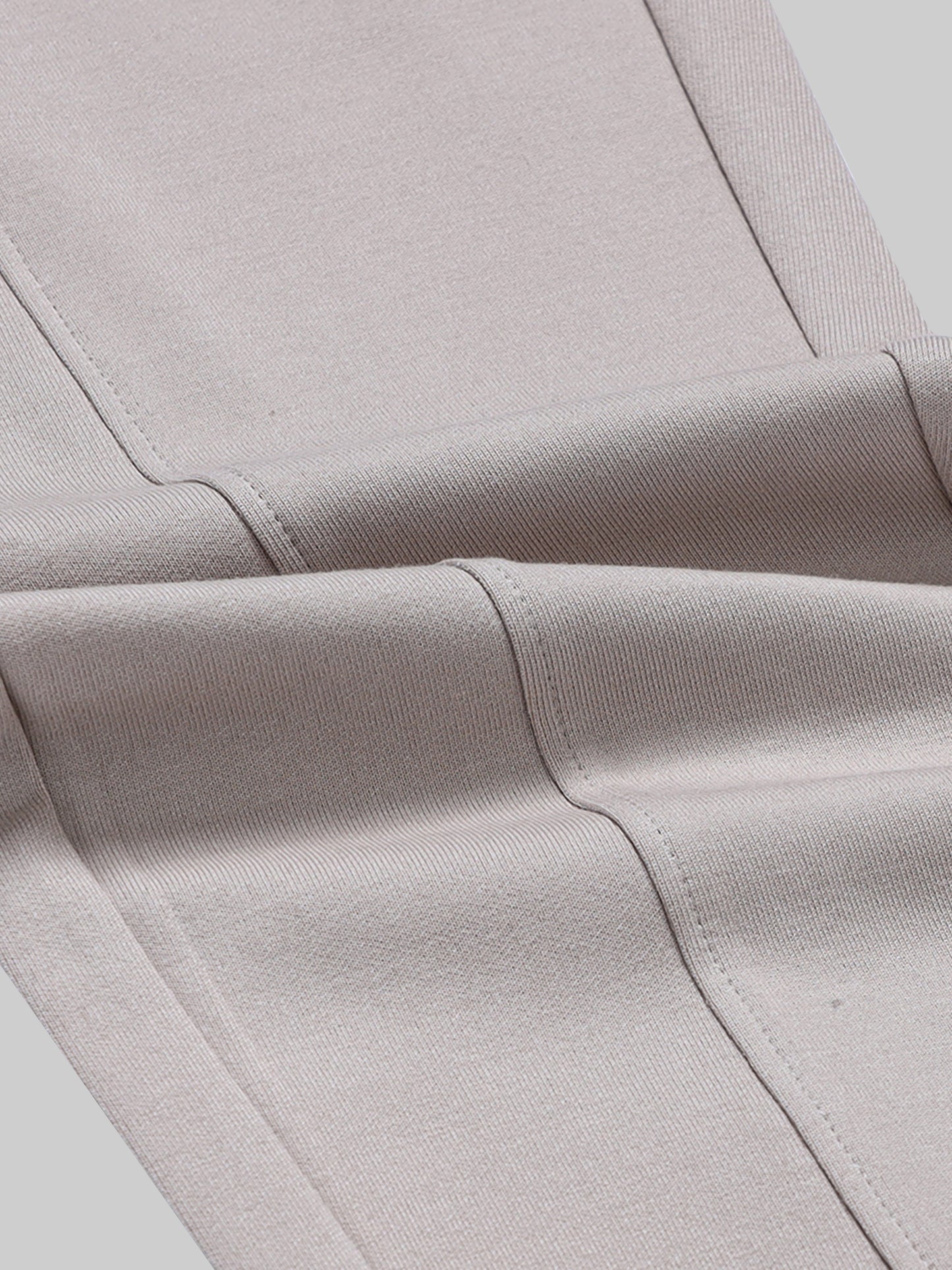 Rougen Cotton Poly Elastane Interlock Jogger with Cut-and-Sew Design and 4-Color Flag Tape Sand