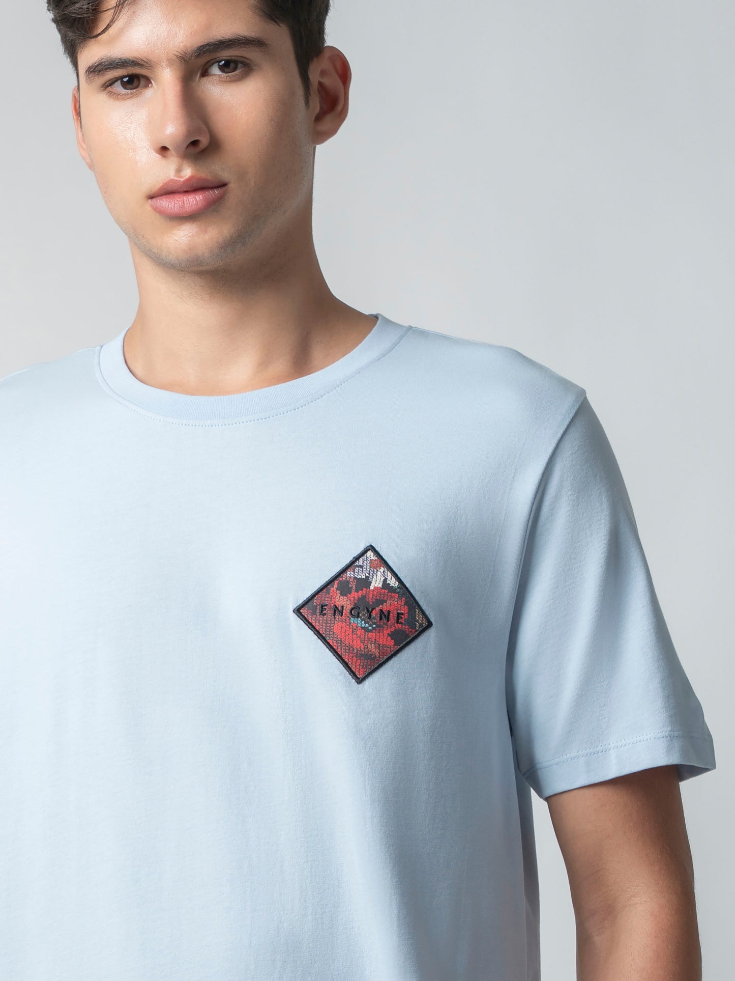 Rougen Cotton Lycra with Sublimation Print and Embroidered Badge Light Blue T-shirt
